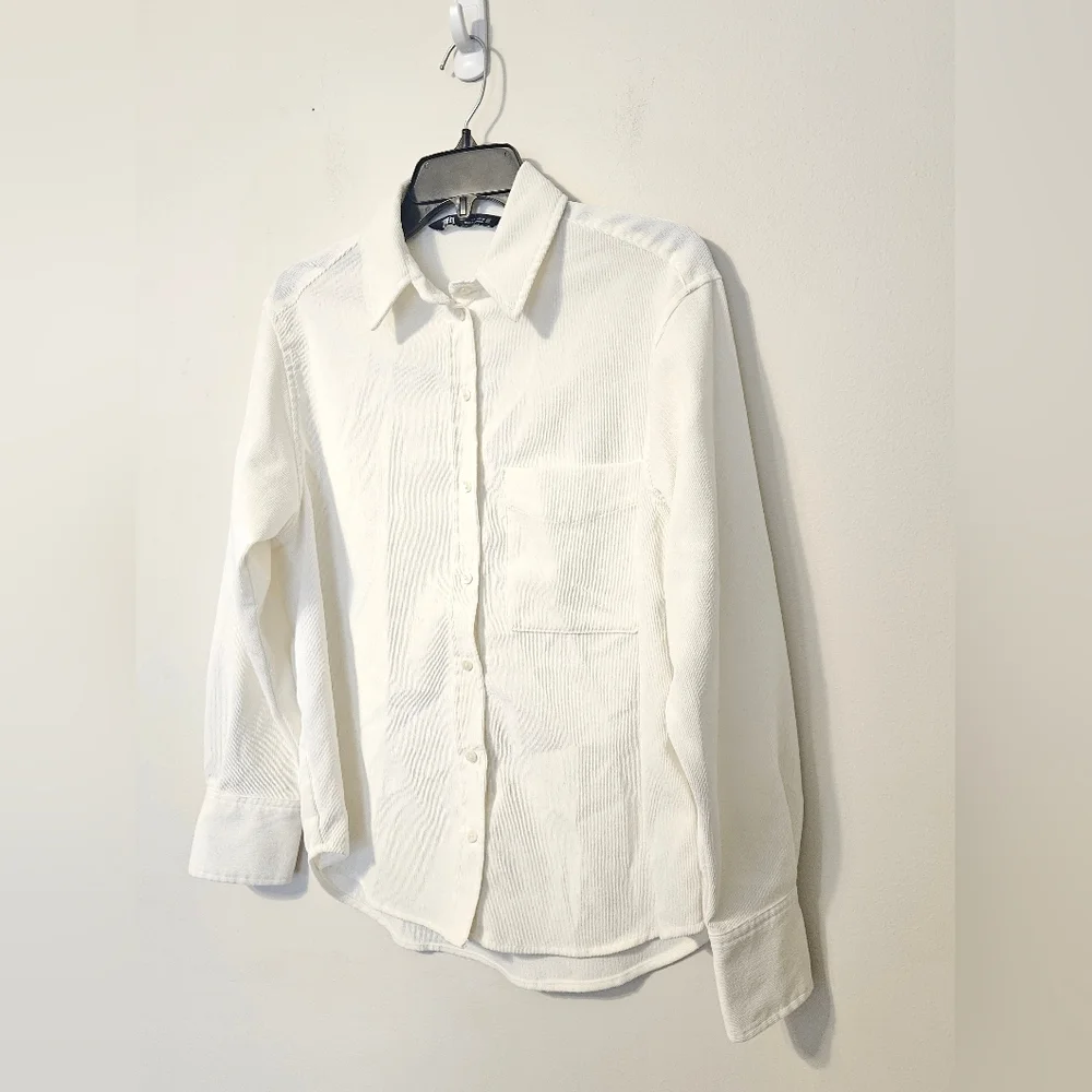 Zara button-up shirt with long sleeves and a single chest pocket